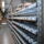 Automated warehouse with RFID-enabled shelving scanning metal parts