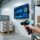 Professional warehouse scene with RFID reader scanning metal shelf, UHF RFID tags on pallets, digital dashboard showing frequency band data, clean blue-gray lighting