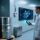 Professional industrial scene showing corrosion-resistant RFID tags on chemical drums, UHF RFID reader scanning, clean warehouse background with digital dashboard