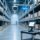 UHF vs HF warehouse RFID technology comparison with industrial scanner and tagged boxes