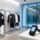 European retail store with RFID-tagged clothing and handheld RFID scanner on modern display