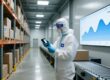 Cold storage warehouse with RFID temperature tags on boxes being scanned by a handheld reader